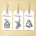 Hand drawn vintage Christmas set of tags with gingerbreads and xmas sock. Vector, sketch Royalty Free Stock Photo