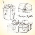 Hand drawn vintage gift box collection. engraved illustration of presents isolated. icon set of present boxes with bow and ribbon Royalty Free Stock Photo