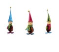 Hand-drawn watercolor illustration isolated on white background. Three New Year`s dwarfs in colorful caps.