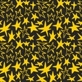 Hand drawn yellow star seamless vector pattern with rough chalk texture on black background. Playful doodle background Royalty Free Stock Photo