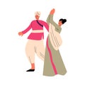 Indian man and woman in traditional clothing dancing during religious holiday Royalty Free Stock Photo