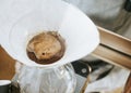 Hand drip coffee, Barista pouring water on coffee ground with filter Royalty Free Stock Photo