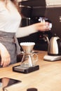 Hand drip coffee, Barista pouring water on coffee ground with filter Royalty Free Stock Photo