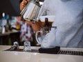 Hand drip coffee kit, barista pouring water on coffee ground with filter Royalty Free Stock Photo