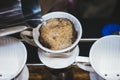 Hand Drip Coffee Pouring hot water on coffee ground Royalty Free Stock Photo