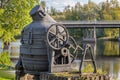 Old hand driven Bessemer converter standing outdoors in sunlight