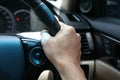 Hand driver chauffeur control steering wheel vehicle Royalty Free Stock Photo