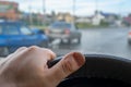 Hand of the driver driving the car at the time of the passage of a traffic accident Royalty Free Stock Photo