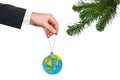 Hand with earth and Christmas tree Royalty Free Stock Photo