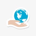 Hand with earth globe sticker icon. Flat sign for mobile concept and web design Royalty Free Stock Photo