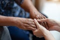 Hand of elderly woman holding hand younger woman, Helping hands, take care for the elderly concept Royalty Free Stock Photo