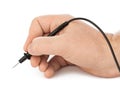 Hand and electric multimeter Royalty Free Stock Photo