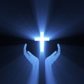Hand embrace god cross light flare