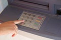 hand enter the secret code on the keypad of the ATM to withdraw Royalty Free Stock Photo