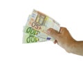 Hand with euro banknotes