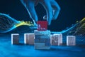 Hand extracts red block from stack, digital lines add futuristic precision