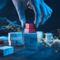 Hand extracts red block from stack, digital lines add futuristic precision