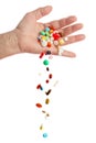 Hand and falling pills Royalty Free Stock Photo