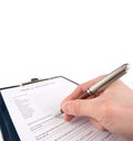 Hand filling in medical questionnaire form Royalty Free Stock Photo