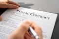 Hand Filling Rental Contract Document Royalty Free Stock Photo