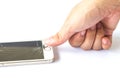 Hand finger touch smartphone broken on white background Royalty Free Stock Photo
