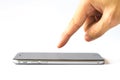 Hand finger touch smartphone on white background Royalty Free Stock Photo