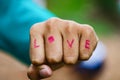 Hand fist write love