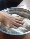 Hand in flour  making arepas Royalty Free Stock Photo