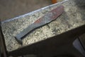 Hand Forged Steel Knife on Anvil