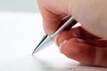 Hand with fountain pen with signature Royalty Free Stock Photo