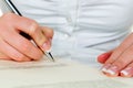 Hand with fountain pen signing contract Royalty Free Stock Photo