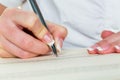 Hand with fountain pen signing contract Royalty Free Stock Photo