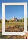Hand Framing Medieval Narva Castle on Clear Day Royalty Free Stock Photo