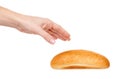 Hand with fresh bun isolated on white background Royalty Free Stock Photo