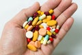 Hand full of pills Royalty Free Stock Photo