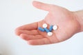 Hand full of medicines pills Royalty Free Stock Photo