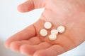 A hand full of medicines pills Royalty Free Stock Photo