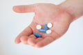 A hand full of pills Royalty Free Stock Photo