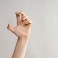 Hand gestures. Zombie hands attack, grabbing something hands with crooked fingers. Royalty Free Stock Photo