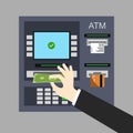 Hand getting money from ATM machine slot. Royalty Free Stock Photo