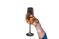 The hand of girl glass of alcoholic beverage on a white background, isolated, holiday atmosphere, weekend