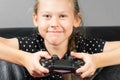 Hand girl playing Sony Dualshock 4 Royalty Free Stock Photo