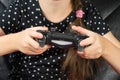 Hand girl playing Sony Dualshock 4 Royalty Free Stock Photo