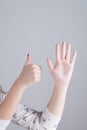 Hand of a girl showing six fingers Royalty Free Stock Photo