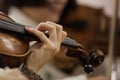 Hand girl on the strings violin Royalty Free Stock Photo