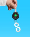 Hand give electric car key infinity arrow sheet metal keyring Royalty Free Stock Photo