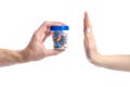 Hand give jar pills to hand renouncement Royalty Free Stock Photo