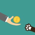 Hand giving golden coin money with dollar sign. Dog cat paw print taking gift. Helping hand concept. Adopt, donate, help, love pet Royalty Free Stock Photo
