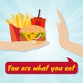 Hand giving junk eating. Food choice concept. You are what you eat