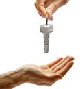 Hand giving key Royalty Free Stock Photo